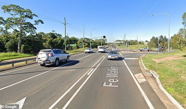 Initial investigations indicate a woman has died after a Mazda CX-8 crashed into a Nissan Pathfinder on Fe Walker Street in Queensland's Bundaberg region (pictured).