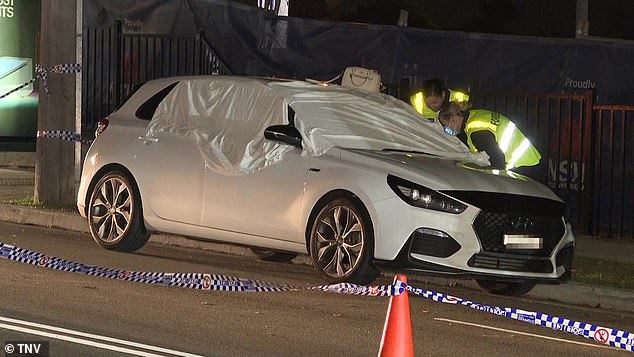 The woman, believed to be in her 40s, was found dead in the passenger seat of the car parked in Durham Street, Hurstville (pictured)