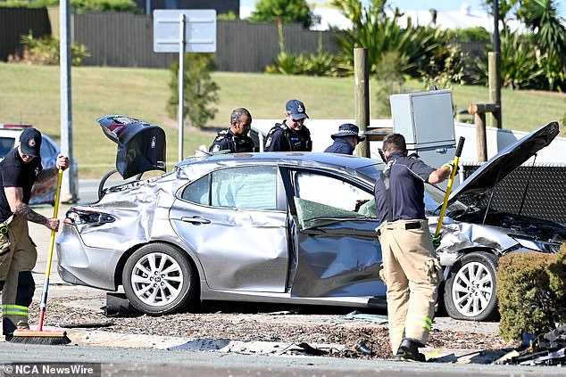 Woman is killed after teenager allegedly runs a red light