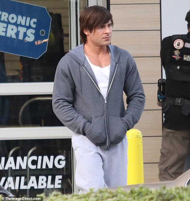 Zac Efron returned to his High School Musical hairstyle when he was spotted filming an upcoming project in Los Angeles this week