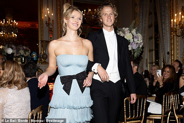 The couple were all smiles as they entered the ballroom