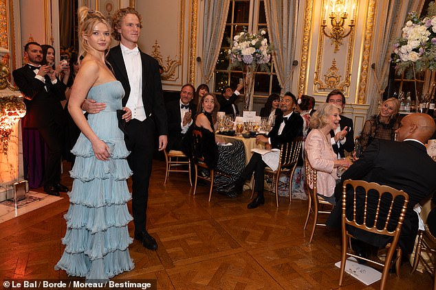 Pictured: Apple Martin with her date Leo Cosima Henckel von Donnersmarck at the Debutante Ball in Paris on Saturday