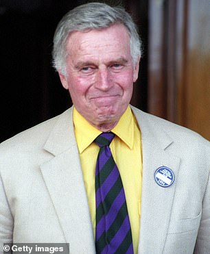 Charlton Heston attends the final of the Wimbledon Men's Tennis Championships at the All England Club on 3 July 1994