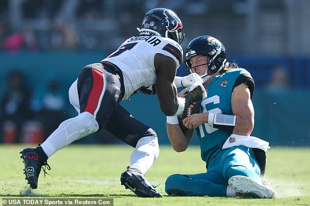 The cleats can be seen on Al-Shaair's feet as he hits Trevor Lawrence and is ejected