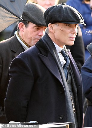 Murphy wore Shelby's signature overcoat and Baker Boy cap on Sunday