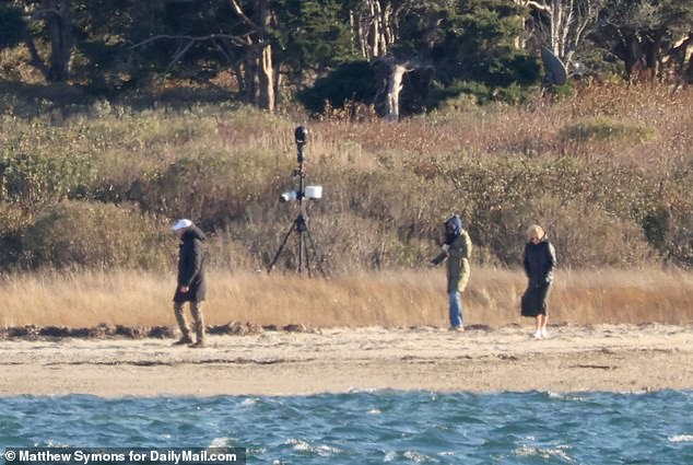 First Lady Jill Biden and daughter Ashley take an afternoon stroll and pick up some shells along a private beach next to the home on Nantucket where the Bidens are spending their Thanksgiving holiday