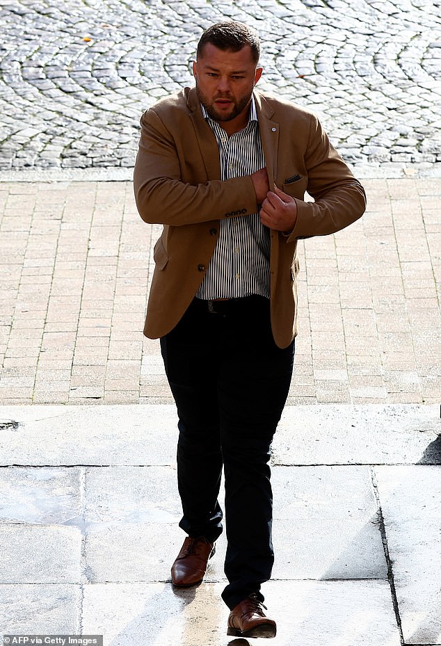 French rugby player Loick Jammes, accused of gang rape, arrives for his trial at the Bordeaux courthouse, south-west Bordeaux, on December 2, 2024.