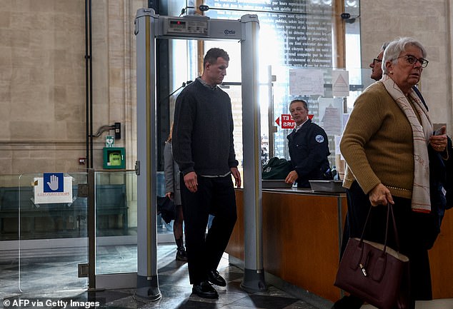 New Zealander Dylan Hayes, accused of failing to prevent a crime, goes through security as he arrives for his trial at the Bordeaux Courthouse, south-west Bordeaux, on December 2, 2024.