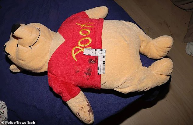 The photo shows the undated Winnie the Pooh cuddly toy being held by the two-year-old girl when she and her mother were shot in Stockholm, Sweden, on October 12, 2023