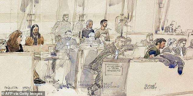 (L-R) defendants Abdelhakim Sefrioui, Louqmane Ingar, Azim Epsirkhanov, Priscilla Mangel, Yusuf Cinar, Brahim Chnina, Nabil Boudaoud and Ismael Gamaev sit during the trial