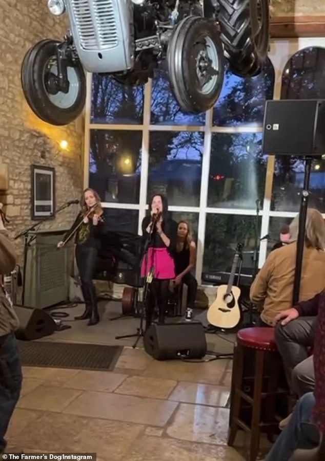 Ellen and Portia were entertained by 90s icons The Coors (pictured) during their night out at Jeremy Clarkson's pub in The Cotswolds