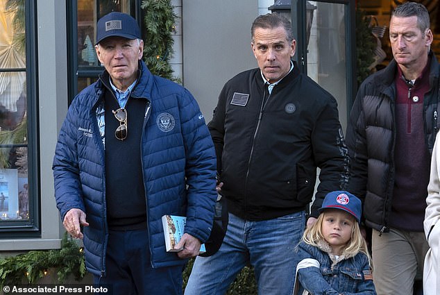 President Joe Biden, accompanied by his son Hunter Biden and his grandson Beau, left a bookstore last Friday as they walked through downtown Nantucket Massachusetts