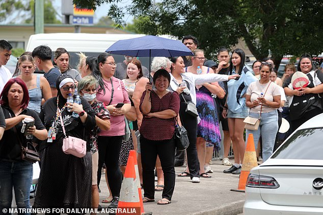 Shoppers waited for hours in the 33 degree Celsius heat