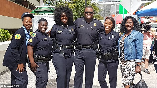 Former Miami Police Chief Weslyne Lewis Francois, third from left, is seen in a photo posted by the department in honor of Black History Month