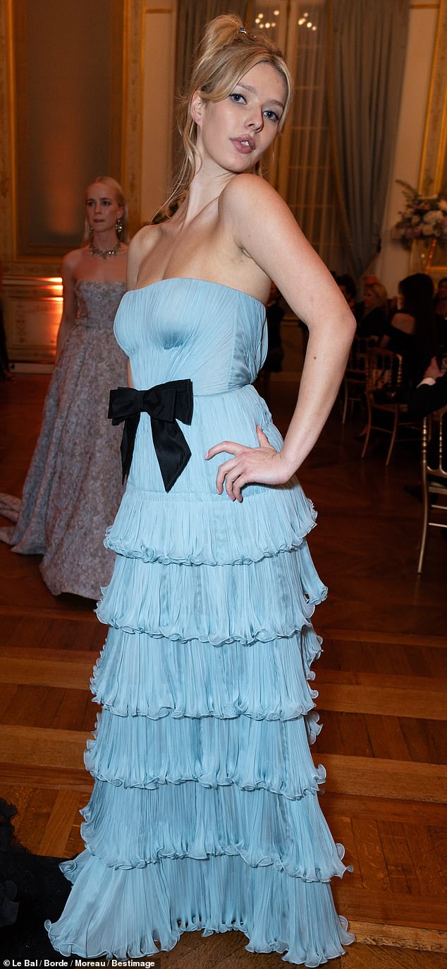 Martin, 20, looked sensational in a sky blue Valentino Haute Couture dress as she attended the ball on the arm of her dashing date, Count Leo Henckel von Donnersmarck