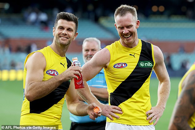 It comes as the Tigers will also keep the shirts of retired AFL stars Trent Cotchin (left) and Jack Riewodlt (right) on ice until 2025