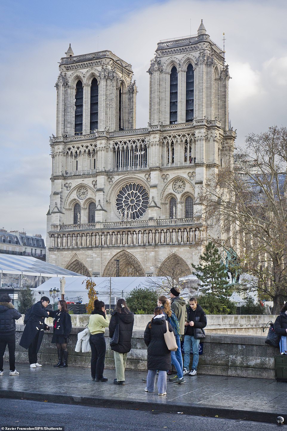 Macron set a five-year deadline to restore the cathedral from the fire. The French president is expected to host about 50 heads of state to witness the reopening of Notre Dame. President Joe Biden is not expected to attend the ceremony in Paris. He arrived in Angola on Monday for the first and only trip to Africa and is expected back at the White House on Thursday.