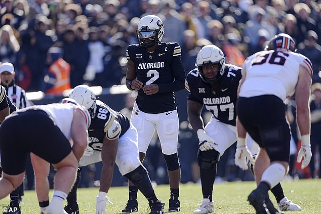 Seaton (second from right) has done a great job protecting quarterback Sanders this season