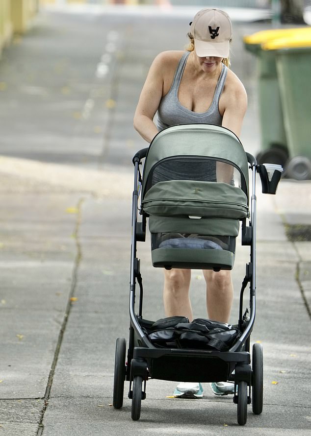 And the Australian model stepped out in the Queensland suburb of Rosalie on Monday with her newborn son Obi