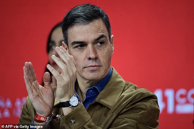 Spanish Prime Minister and Secretary General of the Spanish Socialist Workers' Party (PSOE), Pedro Sanchez, applauds during the inauguration of the 41st Congress of the Spanish Socialist Workers' Party at the Palacio de Exposiciones in Seville, on November 30, 2024