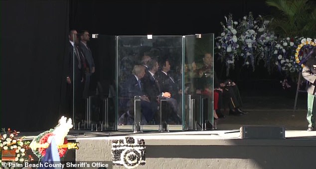 Donald Trump attended the service and watched it from behind bulletproof glass