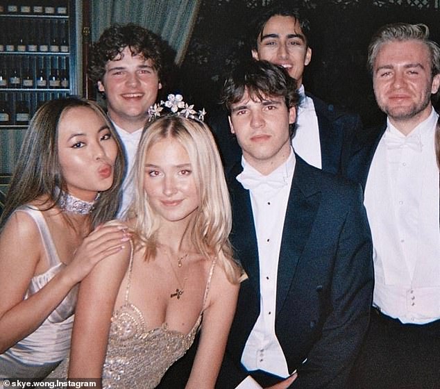 For this year's ball, Wong (left) was dressed in a champagne-colored silky dress with ruffles and a matching choker