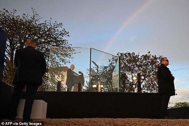 President Joe Biden will deliver a speech Tuesday in front of the National Slavery Museum in Morro da Cruz, Angola. The rainy day gave way to a rainbow