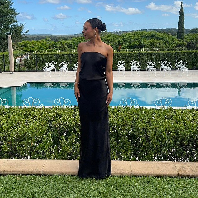 Tammy's sisters wore matching black strapless, bias-cut silk dresses from Natalie Rolt as they watched Tammy tie the knot with husband Matt Zukowski