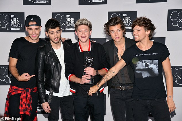 Following Liam's unexpected death at the age of 31 after falling from the third floor of his hotel balcony in Buenos Aires last month, Zayn announced he was postponing the US dates of his tour (One Direction pictured in 2013)