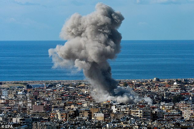 Smoke rises over Beirut after an Israeli attack on November 26. Israel last night threatened to return to the war in Lebanon and attack the state itself if the ceasefire with Hezbollah collapses after the deadliest day since a ceasefire was agreed