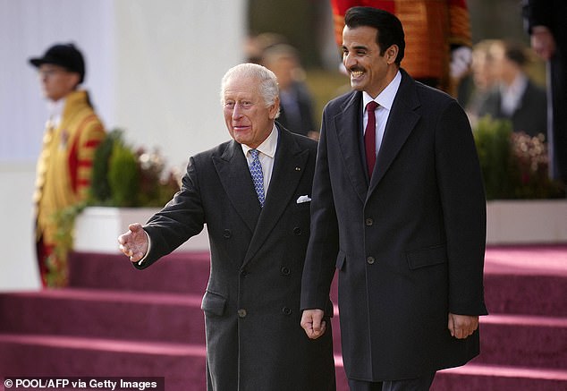 King Charles and Sheikh Tamim bin Hamad Al Thani were pictured inspecting a guard of honour