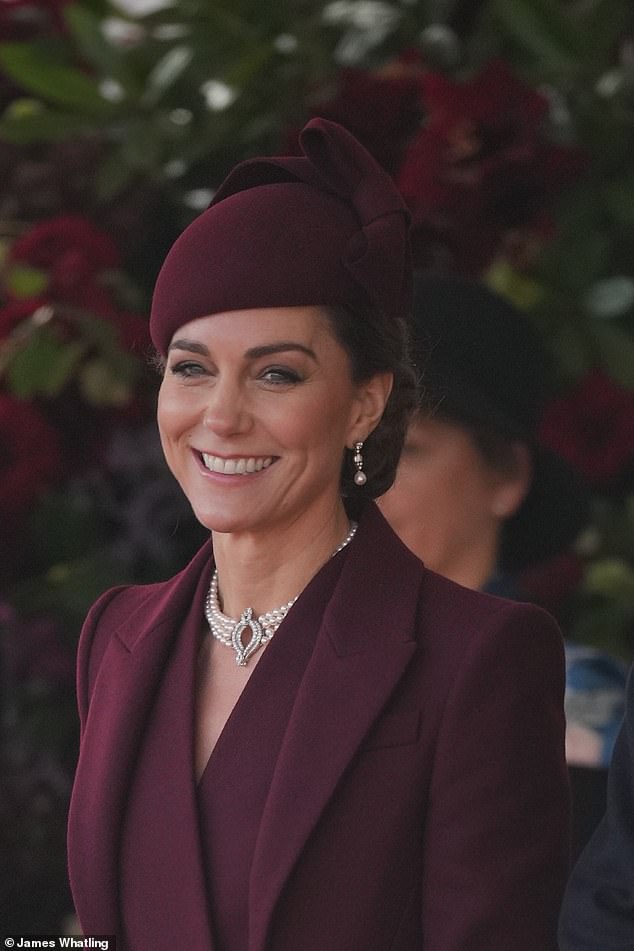 Kate's warm smile and dazzling sense of style were missed. For the elite occasion, she is pictured in a beautiful burgundy ensemble