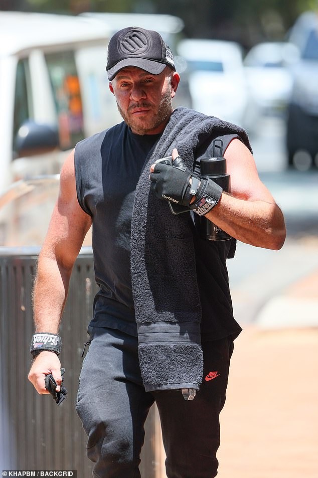 The 61-year-old fashion designer showed off his plump arms in an all-black ensemble, including a sleeveless T-shirt and fitness pants. Alex also wore a fingerless weightlifting glove on his left hand and was seen holding another glove with his other hand