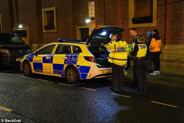 A police car is stationary on the sidewalk near O2 Town Hall, where Zayn was due to perform