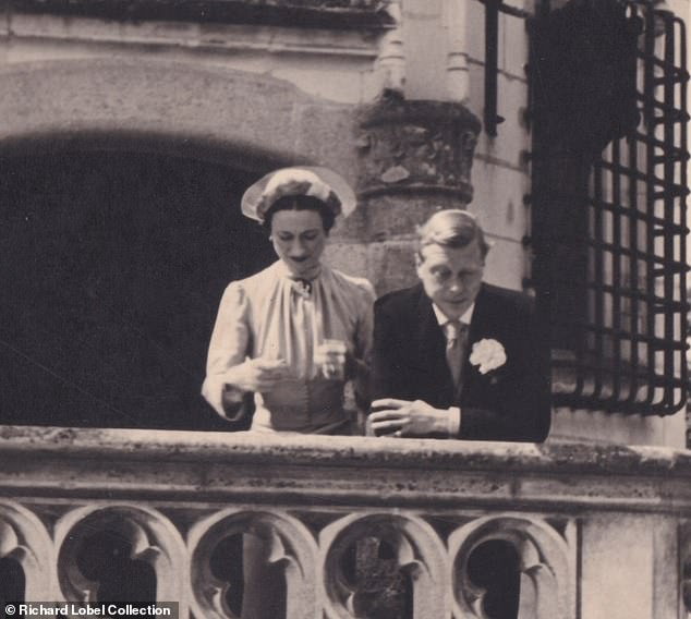 The Duke and Duchess of Windsor stand on a balcony of the Chateau de Cande on their wedding day, June 3, 1937