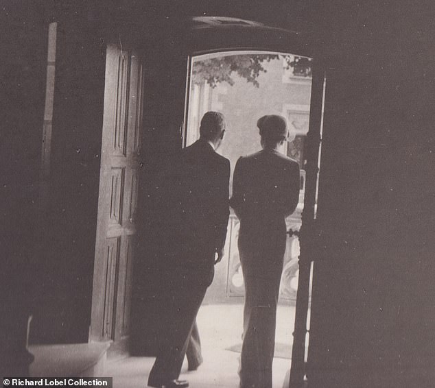 Edward and Wallis were seen walking out the door of the castle on their wedding day