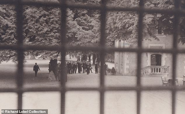 The small group of guests seen outside the castle on Edward and Wallis's big day