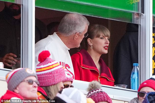 Swift sat next to her father Scott in the stands for the recent improbable victory over the Raiders