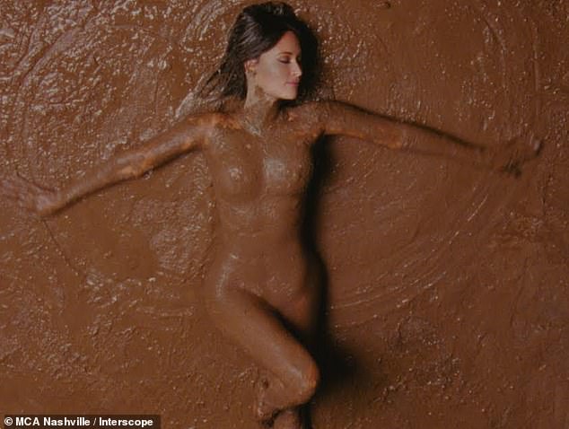 The seven-time Grammy winner covered her naked body in mud for the music video for her single The Architect, premiering Wednesday morning at 9 a.m. PST