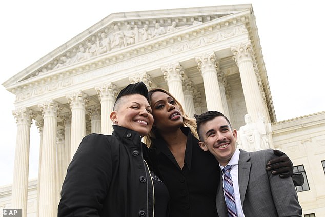 Chase Strangio (right), an attorney with the American Civil Liberties Union, is the first openly transgender person to argue before the justices; Chase is seen above with Sara Ramirez and Laverne Cox before the Supreme Court in October 2019