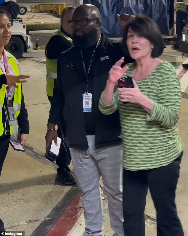 A United employee arrived on the shuttle and began talking to the woman while other passengers shouted and asked her to get the woman off the bus