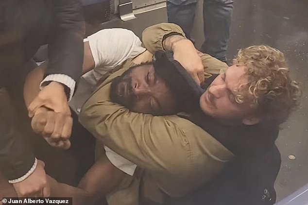 Penny is pictured putting Jordan Neely in a chokehold on a New York subway train on May 1, 2023