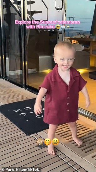 Paris has repeatedly had to defend her parenting skills after being criticized for not putting a life jacket on her son (pictured in August), putting his life jacket on backwards and improperly strapping her children into the car seats