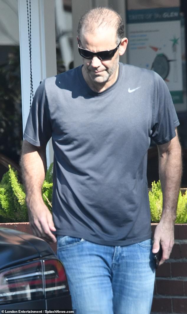 Sampras wore a gray T-shirt, blue jeans and black sunglasses when he appeared in public