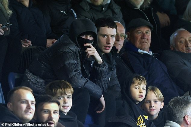 Palmer was also seen at Edgeley Park wearing a balaclava as he watched Stockport play Wrexham