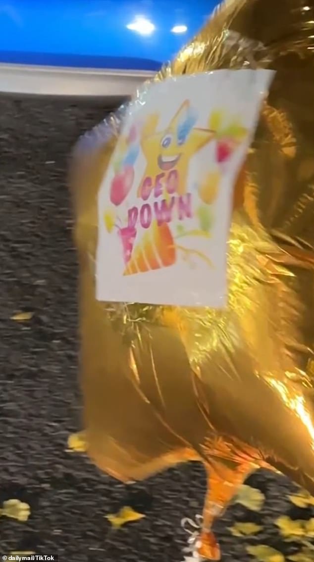 A balloon with a sign reading 