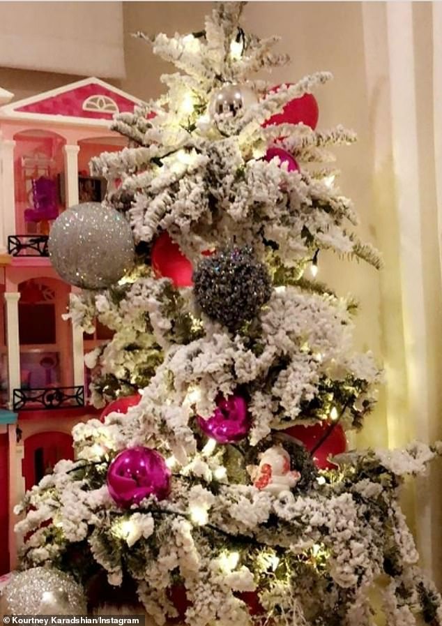 Kourtney showed off a mini tree with large ornaments