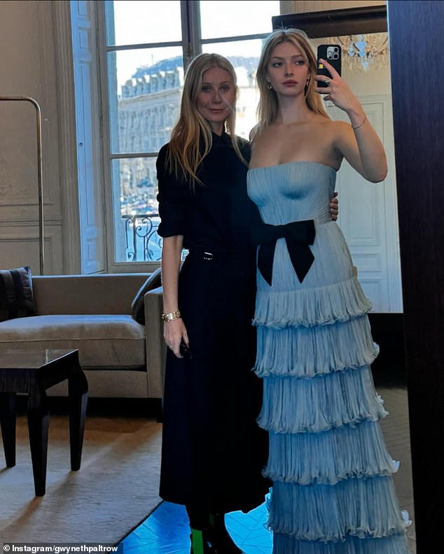 Apple Martin, 20, with her mother Gwyneth Paltrow, in the custom Valentino dress she wore to a debutante ball in Paris