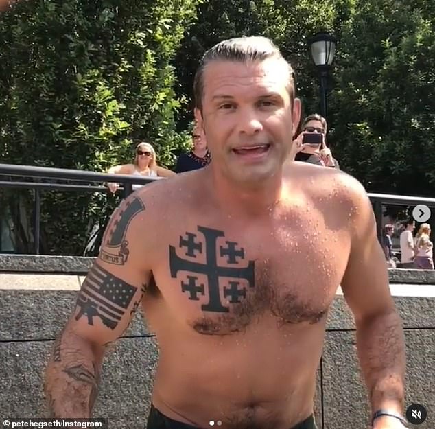 His critics first claimed that a tattoo on his chest indicated hidden white nationalist sympathies. Nonsense: The 'Jerusalem Cross' is an anodyne Christian symbol on display in the Archdiocese of Washington DC.