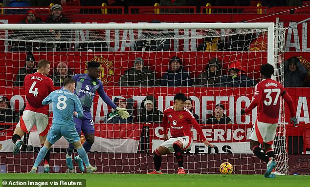 Lisandro Martinez could not keep out Chris Wood's header on the line for Forest's third goal